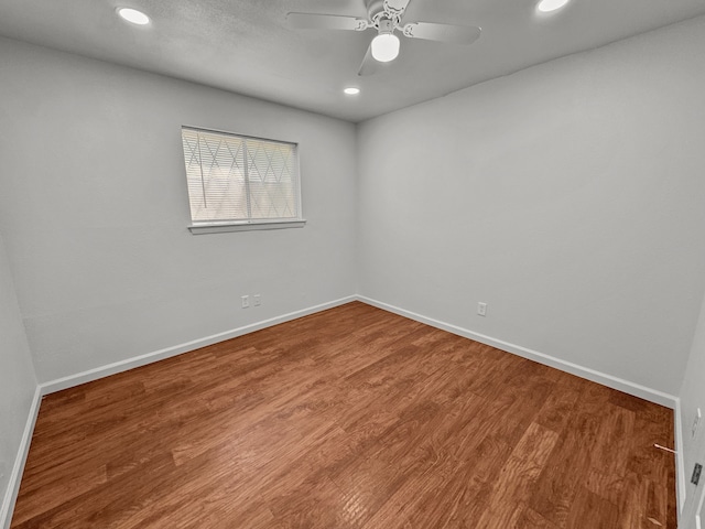 3837 Finley Rd, Irving, TX 75062 - spare room featuring recessed lighting, wood finished floors, baseboards, and ceiling fan