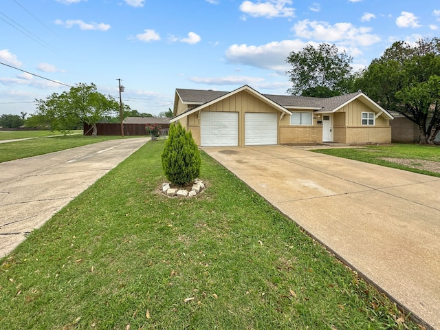 3837 Finley Rd, Irving, TX 75062 - ranch-style home with concrete driveway, an attached garage, board and batten siding, and brick siding