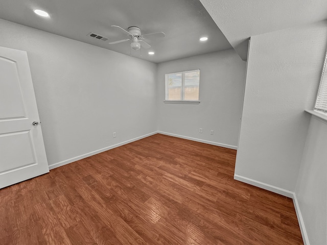 3837 Finley Rd, Irving, TX 75062 - spare room featuring a ceiling fan, wood finished floors, recessed lighting, and baseboards