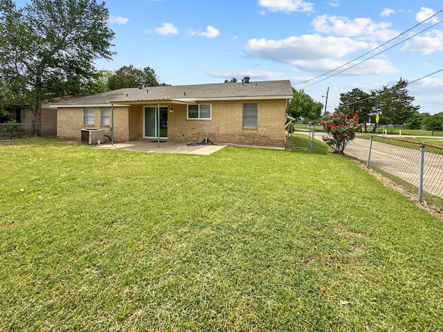 3837 Finley Rd, Irving, TX 75062 - back of property featuring a patio, central AC unit, and brick siding