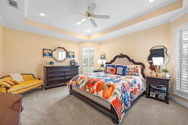 226 Northline Rd, Teague, TX 75860 - carpeted bedroom featuring ornamental molding, multiple windows, a tray ceiling, recessed lighting, and ceiling fan