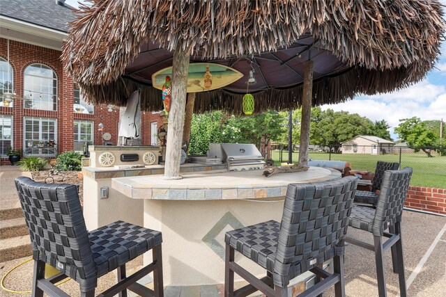 226 Northline Rd, Teague, TX 75860 - view of patio with exterior bar
