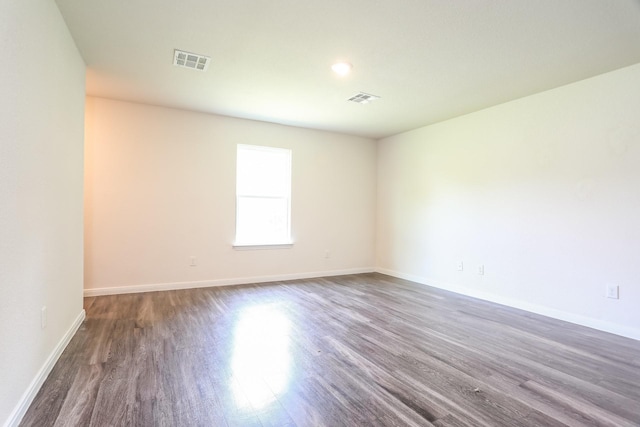 2515 Lyle Ave, Waco, TX 76708 - empty room featuring wood finished floors and baseboards