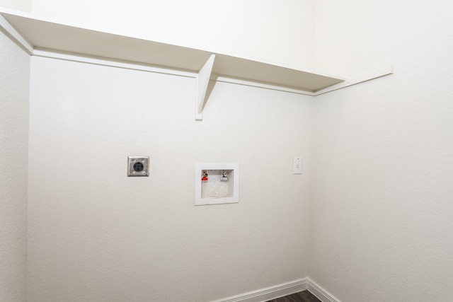 2515 Lyle Ave, Waco, TX 76708 - washroom with hookup for a washing machine, hookup for an electric dryer, baseboards, and wood finished floors
