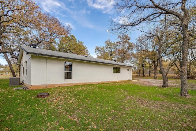 890 Nash Ln, Lipan, TX 76462 - view of property exterior featuring a yard and central AC