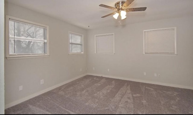 800 SE 16th St, Mineral Wells, TX 76067 - spare room with carpet flooring, baseboards, and a ceiling fan