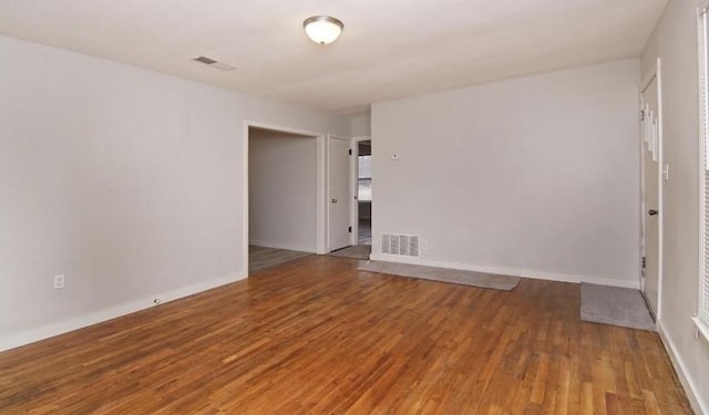 800 SE 16th St, Mineral Wells, TX 76067 - spare room featuring wood finished floors and baseboards