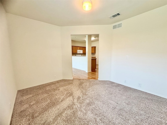 116 Bison Meadow Dr, Waxahachie, TX 75165 - spare room with light carpet and baseboards