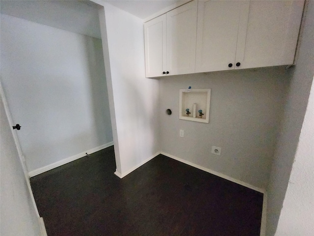 338 Wildbriar Dr, Garland, TX 75043 - laundry room with washer hookup, electric dryer hookup, baseboards, and cabinet space