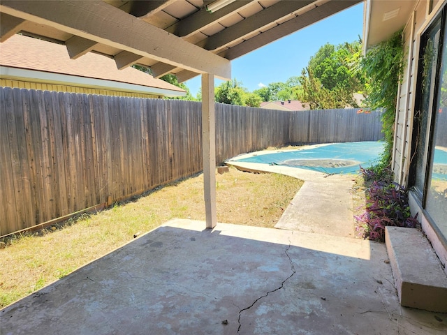 338 Wildbriar Dr, Garland, TX 75043 - fenced backyard featuring a patio area