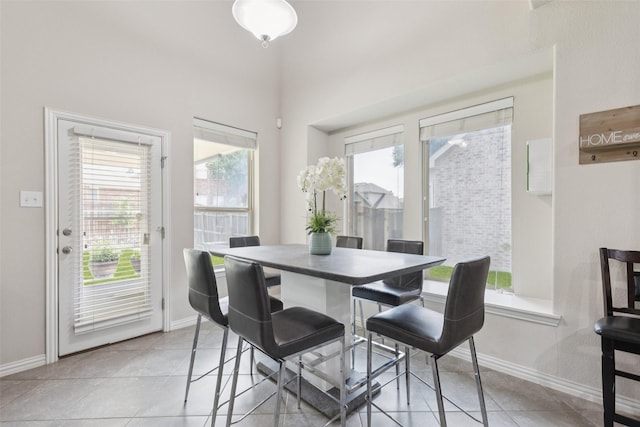 824 Water Garden Cir, Little Elm, TX 75068 - dining area with baseboards and light tile patterned floors