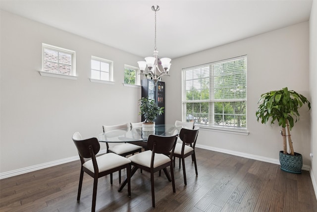 824 Water Garden Cir, Little Elm, TX 75068 - dining space with a chandelier and dark wood-style flooring