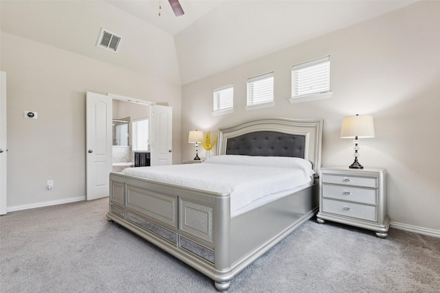 824 Water Garden Cir, Little Elm, TX 75068 - carpeted bedroom with vaulted ceiling, ensuite bath, and ceiling fan