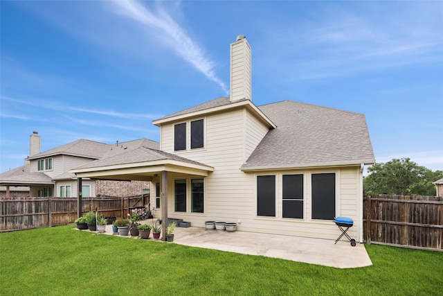 824 Water Garden Cir, Little Elm, TX 75068 - rear view of house featuring a fenced backyard, a patio area, roof with shingles, and a chimney