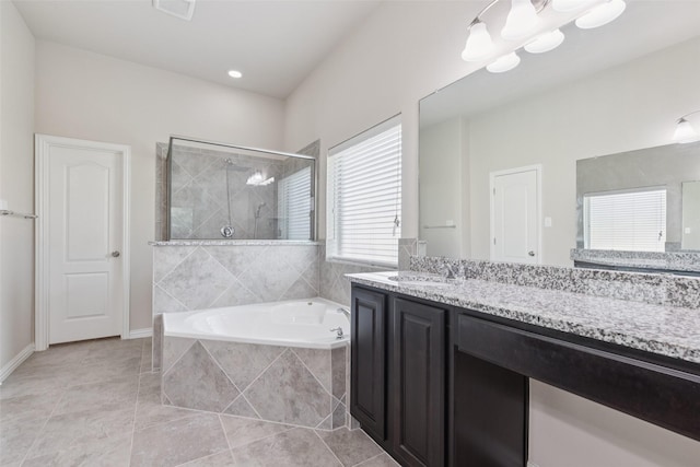 824 Water Garden Cir, Little Elm, TX 75068 - bathroom with a garden tub, vanity, tiled shower, and tile patterned floors