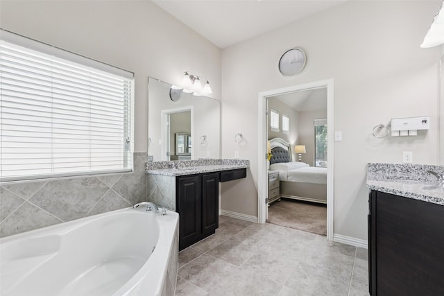 824 Water Garden Cir, Little Elm, TX 75068 - ensuite bathroom featuring a bath and vanity