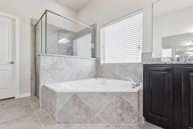 824 Water Garden Cir, Little Elm, TX 75068 - bathroom featuring a bath, a stall shower, vanity, and tile patterned floors