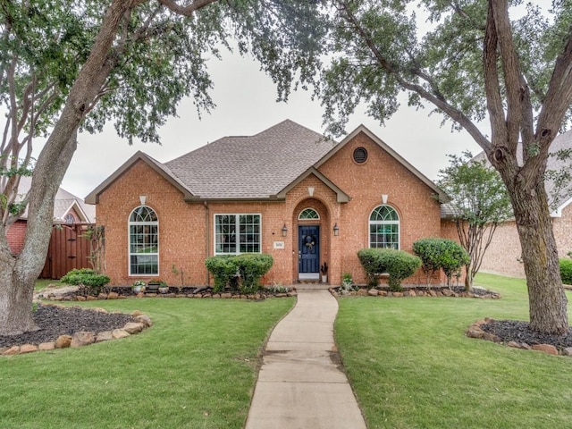 1676 Castle Pines Dr, Frisco, TX 75036 - traditional-style house with brick siding and roof with shingles