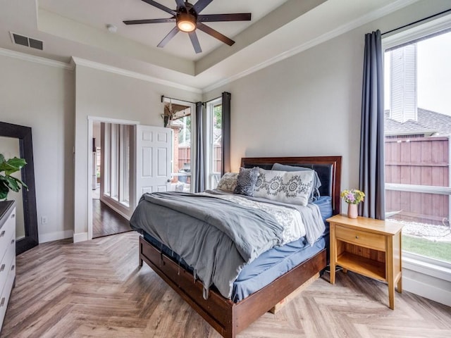 1676 Castle Pines Dr, Frisco, TX 75036 - bedroom with a tray ceiling, baseboards, ornamental molding, and ceiling fan