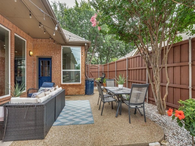 1676 Castle Pines Dr, Frisco, TX 75036 - fenced backyard with a patio area and outdoor dining area