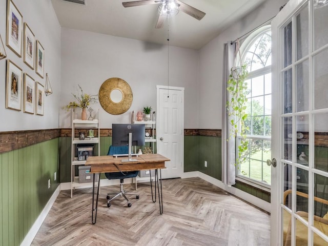 1676 Castle Pines Dr, Frisco, TX 75036 - home office featuring wainscoting, plenty of natural light, ceiling fan, and wooden walls