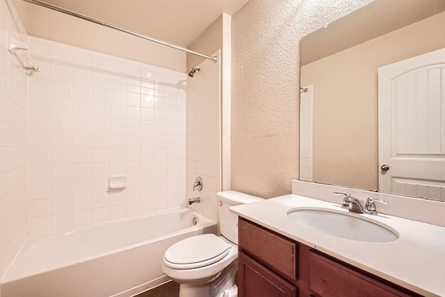 1112 Roman Dr, Princeton, TX 75407 - full bath featuring a textured wall, toilet, vanity, and shower / washtub combination