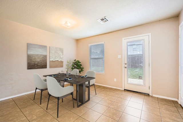1112 Roman Dr, Princeton, TX 75407 - dining area with light tile patterned flooring and baseboards