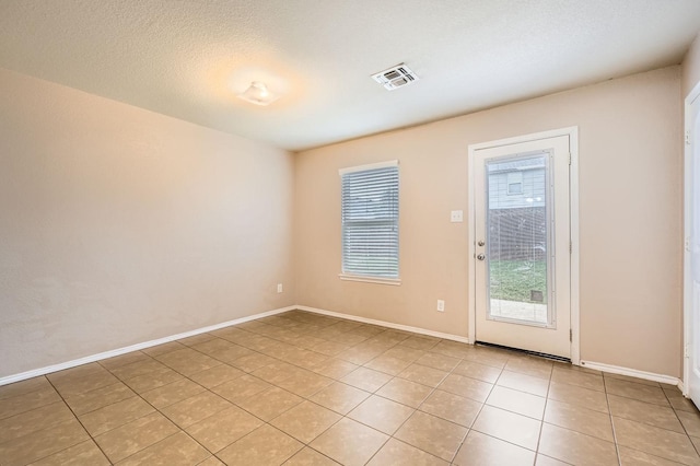 1112 Roman Dr, Princeton, TX 75407 - unfurnished room with light tile patterned flooring and baseboards