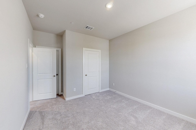 1800 Summer Aura, Mesquite, TX 75181 - unfurnished bedroom featuring light carpet and baseboards
