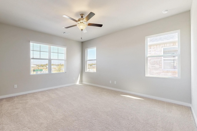 1808 Summer Aura, Mesquite, TX 75181 - spare room with carpet, baseboards, and ceiling fan