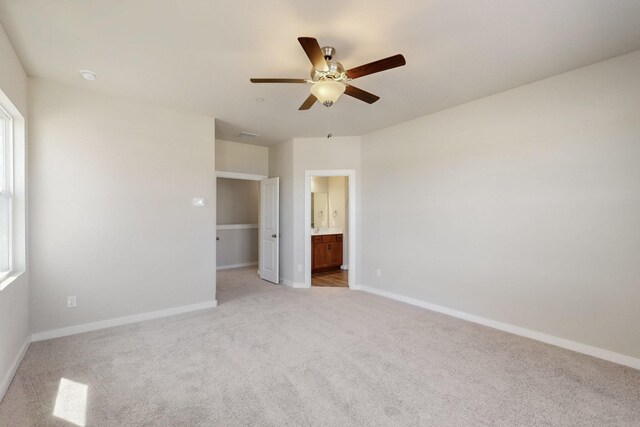 1808 Summer Aura, Mesquite, TX 75181 - empty room with ceiling fan, light carpet, and baseboards
