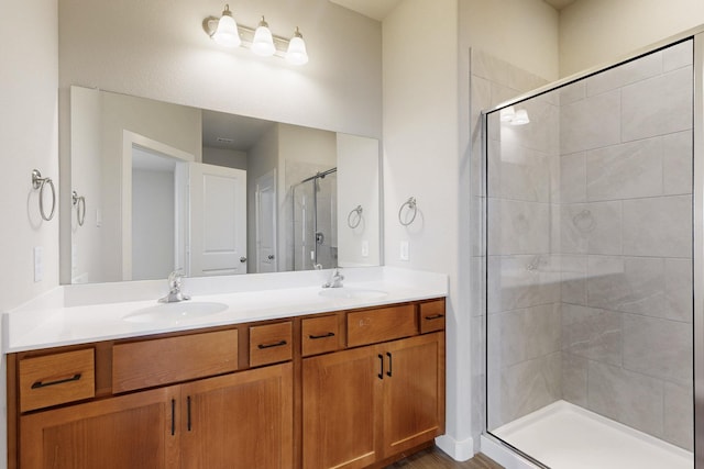 1804 Summer Aura, Mesquite, TX 75181 - full bath featuring a shower stall, double vanity, and wood finished floors