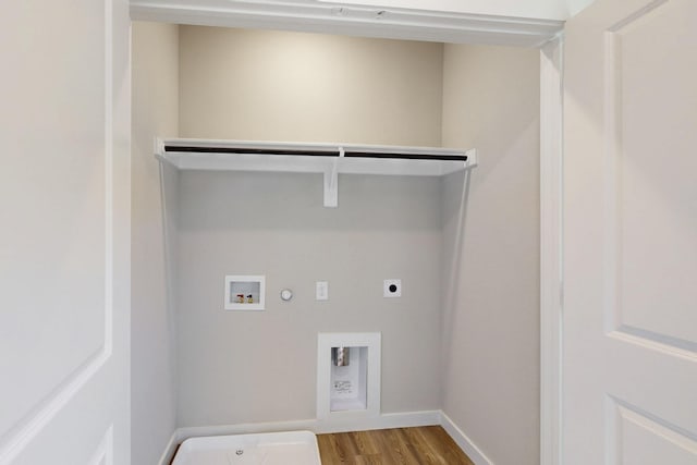 1804 Summer Aura, Mesquite, TX 75181 - washroom featuring gas dryer hookup, electric dryer hookup, wood finished floors, baseboards, and washer hookup