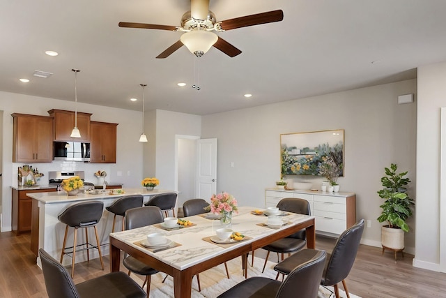 1804 Summer Aura, Mesquite, TX 75181 - dining space with light wood-style floors, ceiling fan, recessed lighting, and baseboards