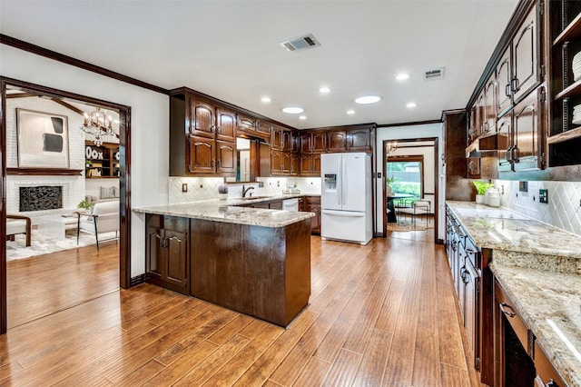 1345 Meadow Gln, Southlake, TX 76092 - kitchen featuring white appliances, ornamental molding, a sink, recessed lighting, and dark brown cabinets