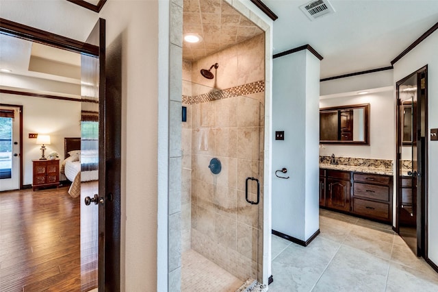 1345 Meadow Gln, Southlake, TX 76092 - ensuite bathroom featuring a stall shower, vanity, crown molding, and baseboards