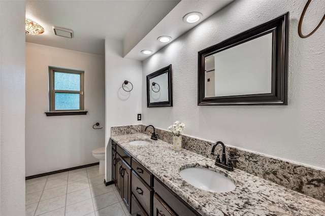 1345 Meadow Gln, Southlake, TX 76092 - bathroom featuring double vanity, toilet, tile patterned floors, and baseboards