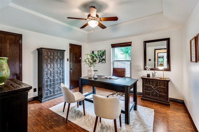 1345 Meadow Gln, Southlake, TX 76092 - home office with hardwood / wood-style flooring, a ceiling fan, baseboards, a raised ceiling, and vaulted ceiling
