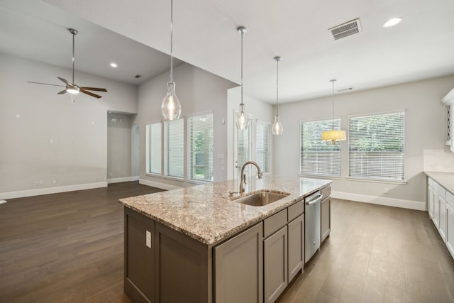 975 Stampede Dr, Frisco, TX 75036 - kitchen featuring a sink, stainless steel dishwasher, dark wood-style floors, baseboards, and ceiling fan