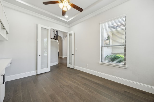 975 Stampede Dr, Frisco, TX 75036 - unfurnished room featuring plenty of natural light, ceiling fan, dark wood-style floors, ornamental molding, and baseboards