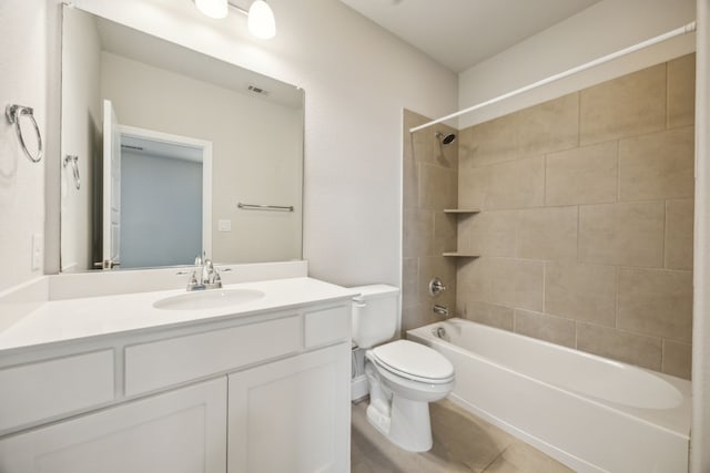 975 Stampede Dr, Frisco, TX 75036 - bathroom with toilet, vanity, shower / bathtub combination, and tile patterned floors
