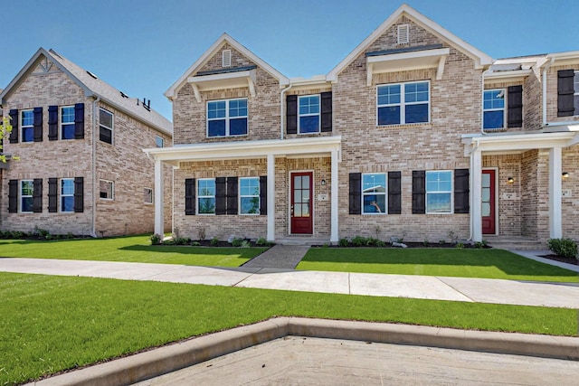 1812 Summer Aura, Mesquite, TX 75181 - view of front facade featuring a front yard and brick siding
