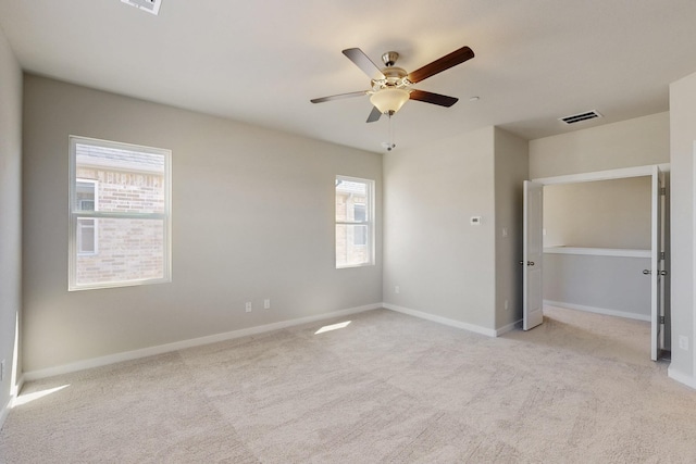 1812 Summer Aura, Mesquite, TX 75181 - unfurnished bedroom with multiple windows, baseboards, and light colored carpet