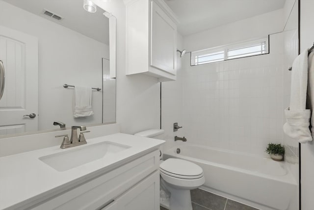 2821 White Plains Dr, Midlothian, TX 76065 - full bathroom featuring vanity, toilet, washtub / shower combination, and tile patterned floors