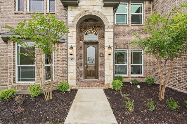 2821 White Plains Dr, Midlothian, TX 76065 - doorway to property with brick siding and stone siding