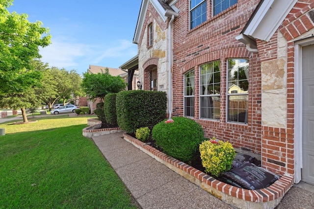 11873 Lampwick Ln, Frisco, TX 75035 - doorway to property with brick siding and a lawn