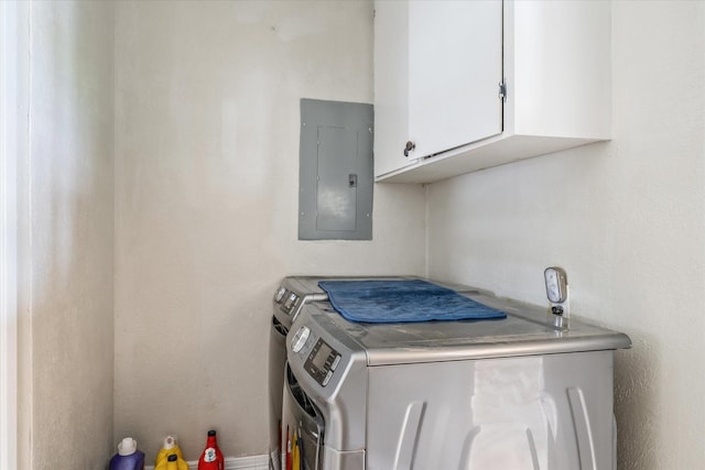 107 Oak Acres Dr W, Malakoff, TX 75148 - washroom featuring electric panel, separate washer and dryer, and cabinet space