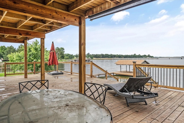 107 Oak Acres Dr W, Malakoff, TX 75148 - wooden terrace with outdoor dining area and a water view