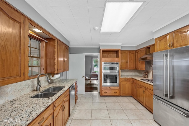 5918 Fern Ave, Shreveport, LA 71105 - kitchen with appliances with stainless steel finishes, a sink, open shelves, decorative backsplash, and crown molding