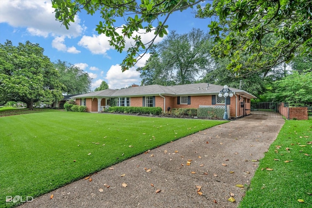 5918 Fern Ave, Shreveport, LA 71105 - ranch-style home with driveway, brick siding, and a gate